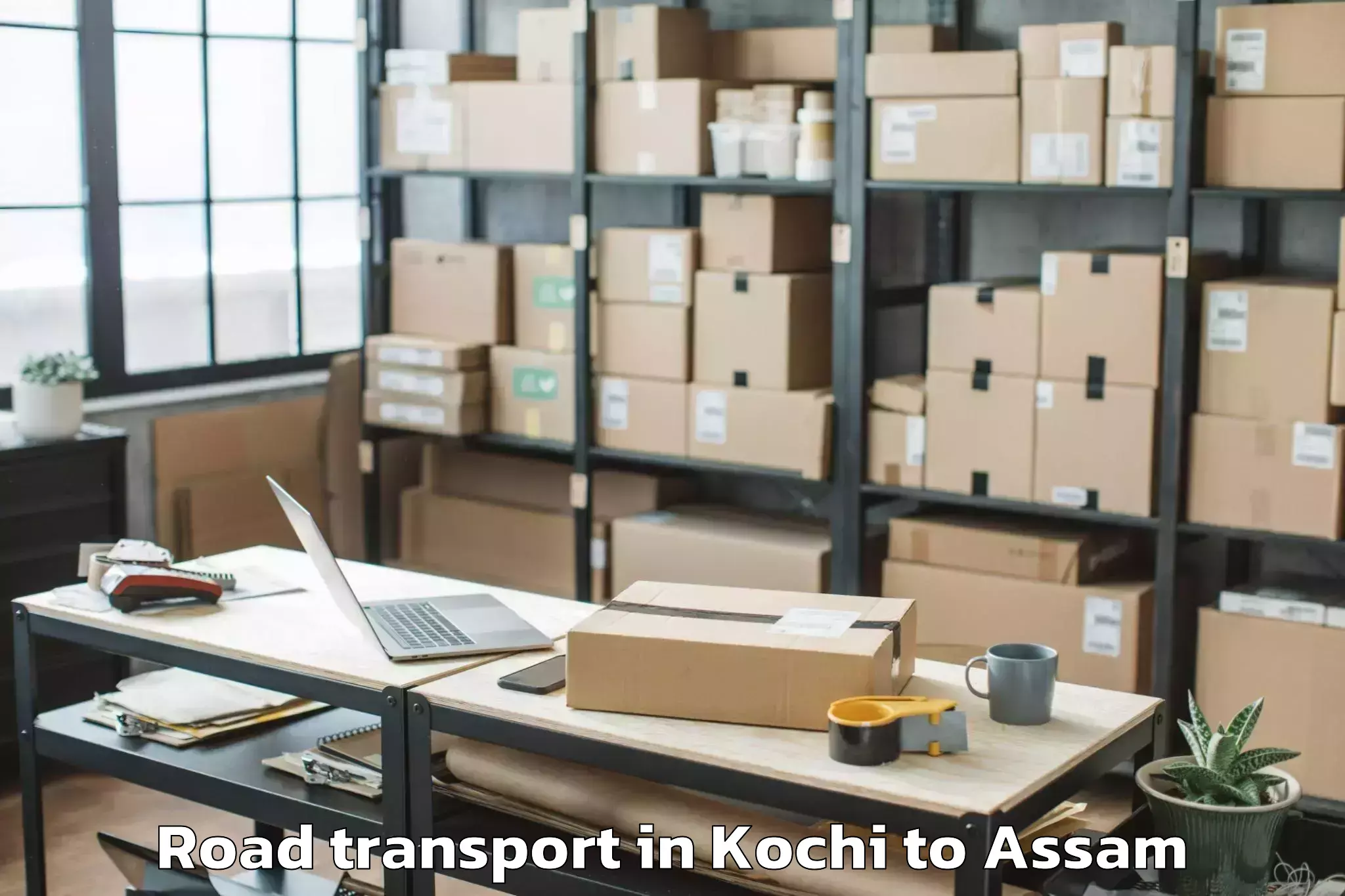 Book Kochi to Sarupeta Pt Road Transport